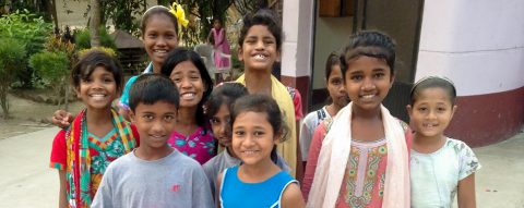 A smiling group of children at Bangla Hope.