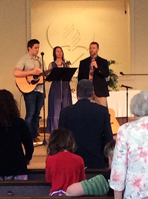 Praise team leading out in music part of service.